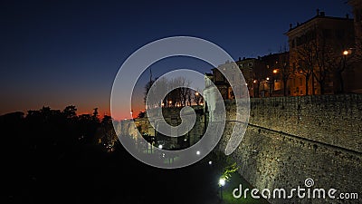 Bergamo, old city. Italy. Fiery sunset from the Venetian walls Stock Photo