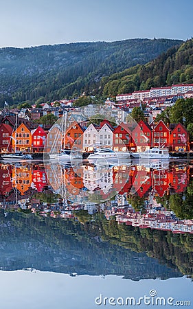 Bergen street at night with boats in Norway, Unesco World Heritage Site Stock Photo