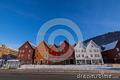 Bergen waterfront cityscape.with pucturesque bryggen houses in colorful theme in front of the wharf. Looking from across the Stock Photo