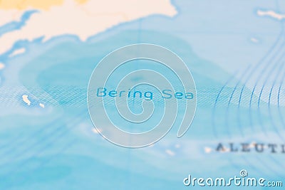 Bering Sea in Focus on a Tilted World Map. Stock Photo