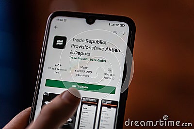 The Trade Republic App is opened in the playstore on an android mobile phone. Editorial Stock Photo