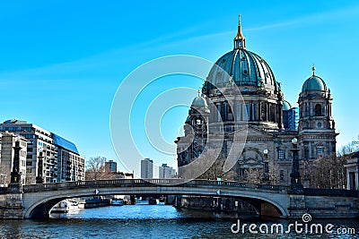 Berlin Cathedral (Berliner Dom) on the Museum Island on the Friedrichsbrucke bridge over the Spree river Berlin Editorial Stock Photo