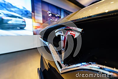 The emblem of the full-sized, all-electric, luxury, crossover SUV Tesla Model X Editorial Stock Photo