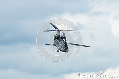 Demonstration flight of transport helicopter Boeing CH-47 Chinook. Editorial Stock Photo