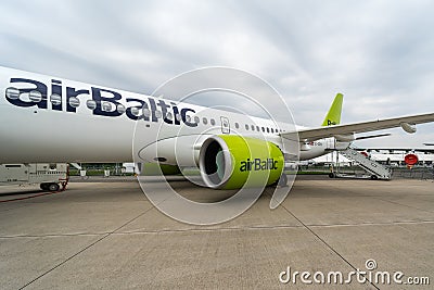 Fragment of the narrow-body jet airliner Bombardier CS300, by AirBaltic. Editorial Stock Photo