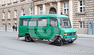 Empty green police van parked in the street on December 30, 2019 in Berlin Editorial Stock Photo