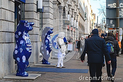 Berlin, Germany - December 02, 2016:Sculptures of large blue bears opposite the Nivea store in Berlin street Editorial Stock Photo