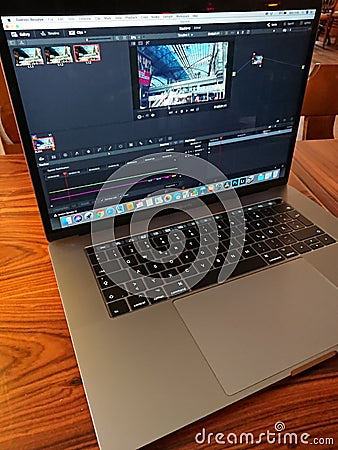 Apple MacBook Pro computer and DaVinci Resolve editing software Editorial Stock Photo