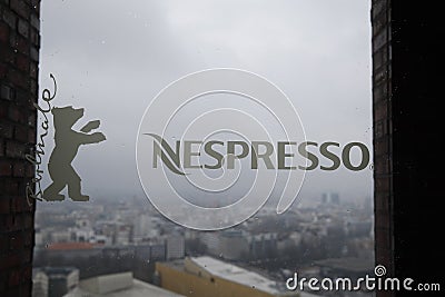 Nespresso and Berlinale logo on glass door Editorial Stock Photo