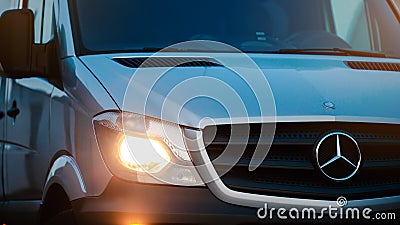 Berlin, Germany - January 29, 2020: Passenger van Mercedes-Benz Sprinter. Front grill, logo and headlights. Editorial Stock Photo