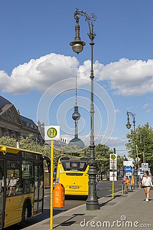 Lamp post against the background of a television tower on a street in Berlin Editorial Stock Photo