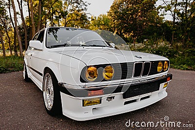 Berlin, Germany - July 07, 2020: Original BMW M3 e30 outdors, BBS wheels, tunning M Tech, glossy and shiny old classic ci Editorial Stock Photo