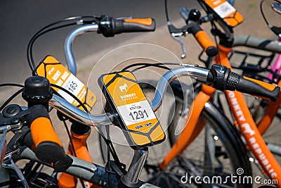 Donkey Republic bicycles for rent offering bike sharing in the Editorial Stock Photo