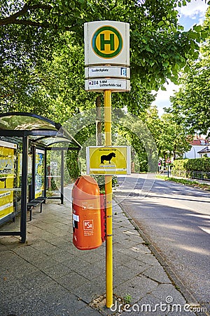 Humorous advice for keeping your distance at a bus stop operated by the Berliner Verkehrsbetriebe BVG Editorial Stock Photo