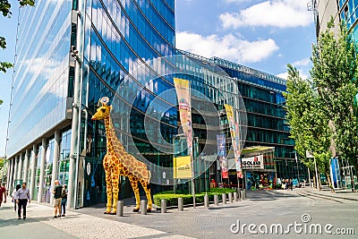 Giraffe sculpture outside the Lego Discovery Centre in Berlin. Editorial Stock Photo
