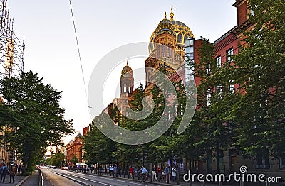 View to the dome and the small towers of New Synagogue in the downtown of Berlin in the evening sun Editorial Stock Photo