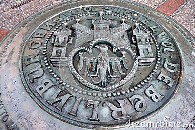 Copy of the original seal of Berlin set in the pavement outside the Nikolaikirche Editorial Stock Photo