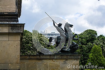 14.05.2019. Berlin, Germany. The old historical building on city streets. The historical museum with sculptures from metal on the Editorial Stock Photo