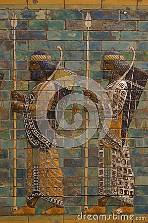Berlin, Germany: Pergamon Museum, Ishtar Gate of Babylon, two warriors Editorial Stock Photo