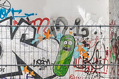 BERLIN, GERMANY - September 26, 2018: Close-up of a graffiti art of the `Pickle Rick` character of the `Rick and Morty Editorial Stock Photo