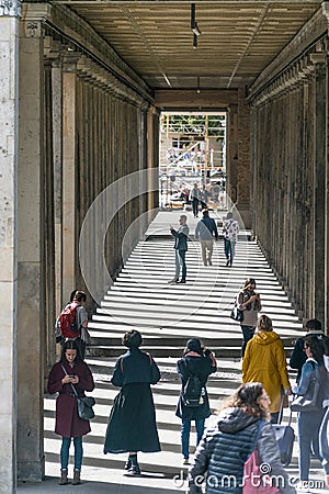 BERLIN, GERMANY - SEPTEMBER 26, 2018: Vertical and Downwards perspective of a group of people taking pictures under a Editorial Stock Photo