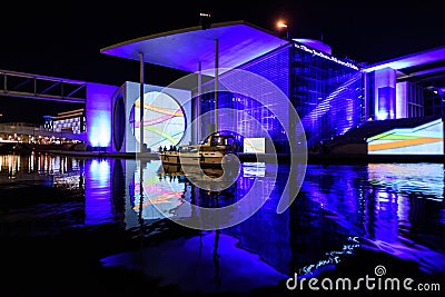 Berlin - light show over government offices downtown on the Spree river Editorial Stock Photo