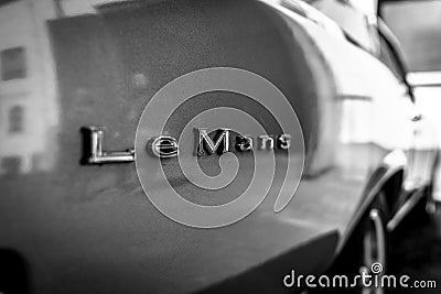 The emblem of a mid-size car Pontiac LeMans, 1967 Editorial Stock Photo
