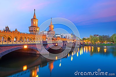 Berlin skyline with Oberbaum Bridge and Spree River, at sunrise Stock Photo