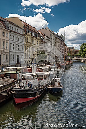 Berlin, Spree river, Germany. Old river ships at the embankment Editorial Stock Photo