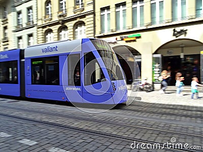 Tram circulating on a street in the city of Bern, Switzerland Editorial Stock Photo