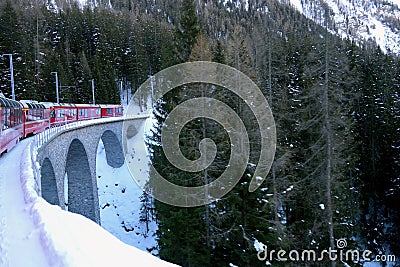 Bernina Express through the Swiss Alps Editorial Stock Photo