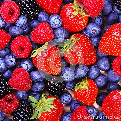 Berries Background. Strawberries, Blueberry, Raspberries Stock Photo