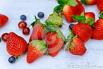 Berries Background. Strawberries, Blueberry, Raspberries, and Blackberry. Stock Photo