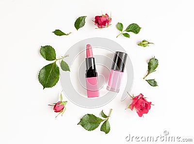 Berry color decorative cosmetics with roses white background top view Stock Photo