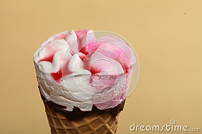 Berry icecream waffle cone on orange Stock Photo