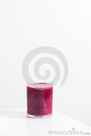 Berry smoothie in a glass. Detox, healthy eating. Copy space. Stock Photo