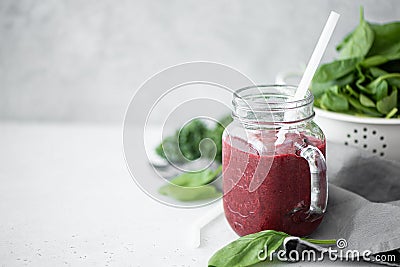 berry smoothie with spinach and chia seeds Stock Photo