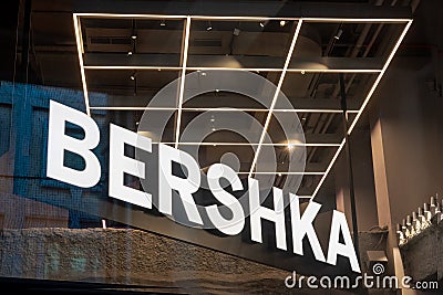 Bershka logo signboard in shop on display for customers Editorial Stock Photo