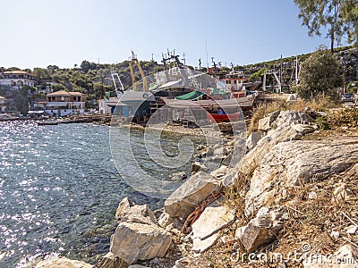 Best beaches of Pelion peninsula. Bright colored umbrellas. Pagasetic gulf. Greece. Editorial Stock Photo