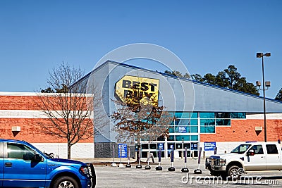 Best Buy retail store parking lot and building clear blue sky Editorial Stock Photo