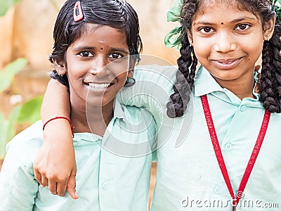 Best children friends girls classmates smiling standing with hand on shoulder at the school. Multiethnic school kids enjoying Editorial Stock Photo