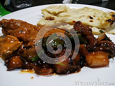 Best foddiie food nan and butter chicken with chilli chicken Stock Photo