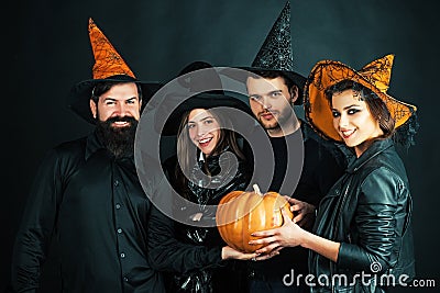 Best friends celebrated Halloween. Halloween poster or greeting card - people concept. Halloween Party group. Stock Photo