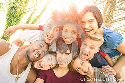 Best friends taking happy selfie outdoor with back lighting Stock Photo