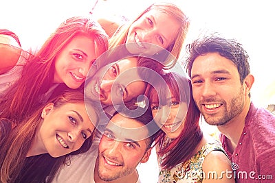 Best friends taking selfie outdoors with backlight contrast halo Stock Photo