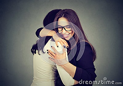 Best friends two women hugging each other Stock Photo