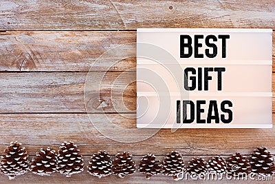 Best Gift Ideas text in lightbox on winter table Stock Photo