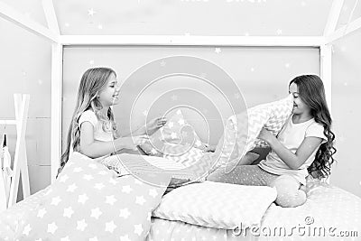 Best girls sleepover party ideas. Girls happy best friends in pajamas with pillows sleepover party. Soulmates girls Stock Photo