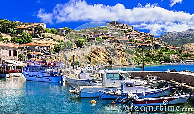 Best of Greece - scenic Lesvos island. Molyvos Mythimna town. view of port and medieval castle on hill top Editorial Stock Photo