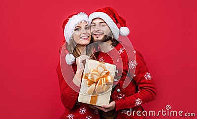 Best holiday. happy family share presents in winter. merry christmas. man and woman love party. knitted warm clothes Stock Photo